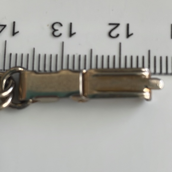 Vintage coin charm bracelet with various European coins on a silver tone chain - Picture 12 of 12